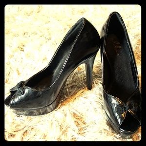 Ellie black peep toe pumps/heels with rosettes